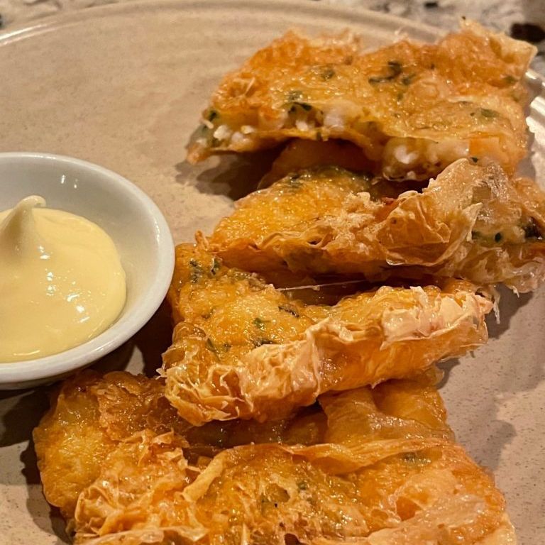Fu Pei Gyun crispy tofu skin rolls with dipping sauce